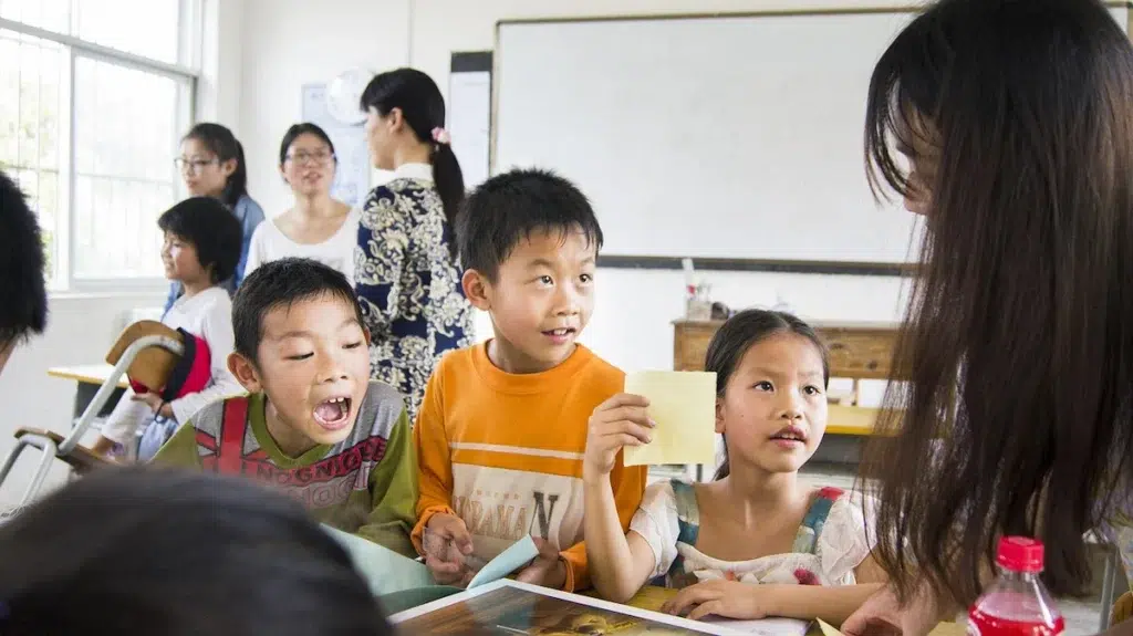 teacher and students in an effective learning environment in a university classroom