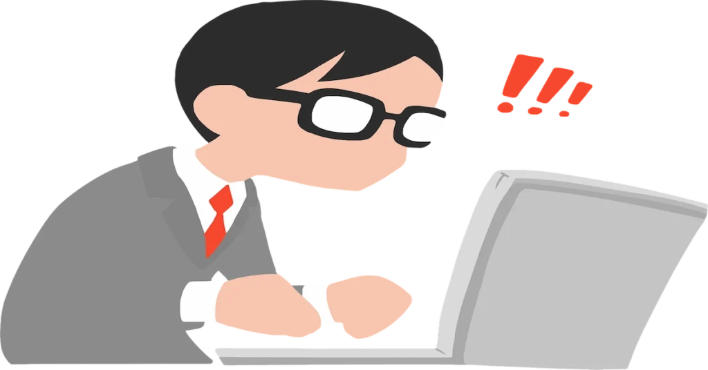 Person surprised while using laptop