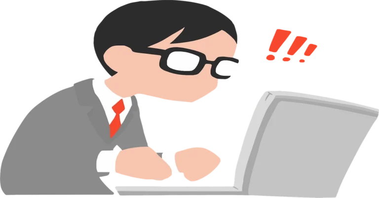 Person surprised while using laptop